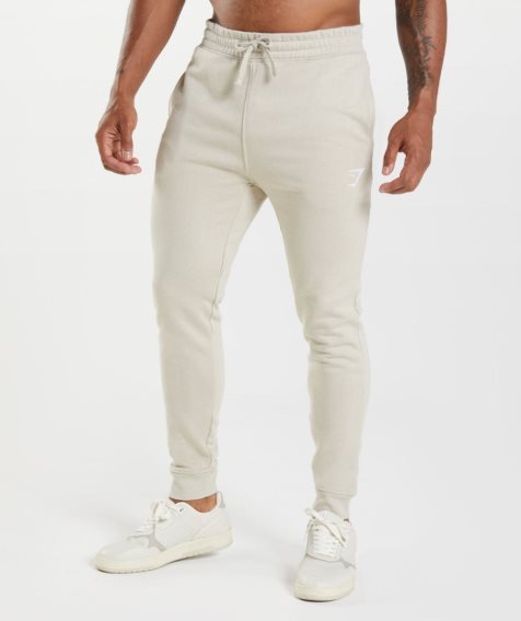 Pantalones Jogger Gymshark Crest Hombre Creme | ES7826-MY