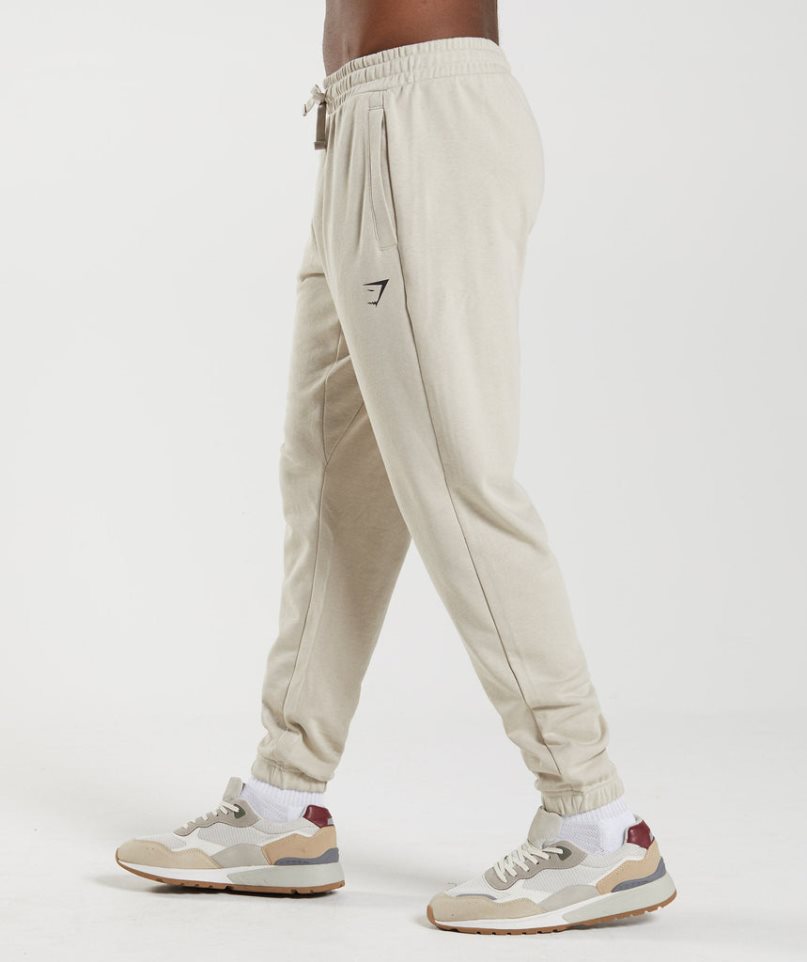 Pantalones Jogger Gymshark Essential Oversized Hombre Creme | ES7089-MA