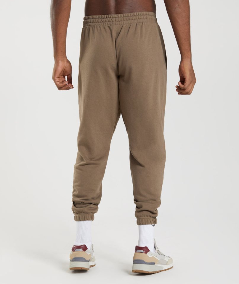 Pantalones Jogger Gymshark Essential Oversized Hombre Marrones | ES8471-VQ